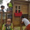 Parque de jogos infantil de madeira Taga com parede de escalada